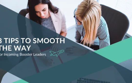 CutTime Blog Article 8 Tips for Smooth Booster Transition with two female boosters reviewing documents at a table