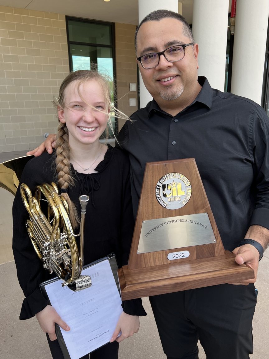 Freddy Chavez celebrates a successful middle school fine arts year with one of his top achieving students.